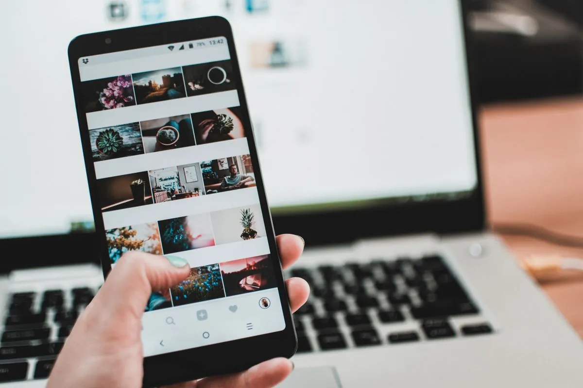 A person scrolling a social feed on their phone